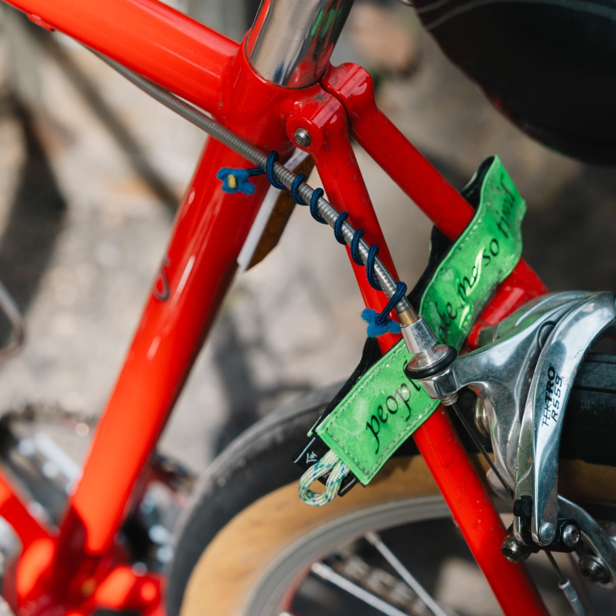 GHOOOST Twist Flowers tidying brake cable housing on a red bike