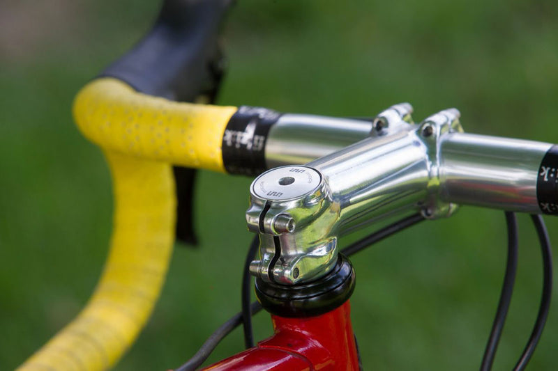 Threadless stem close-up: stem clamps the steerer with pinch bolts
