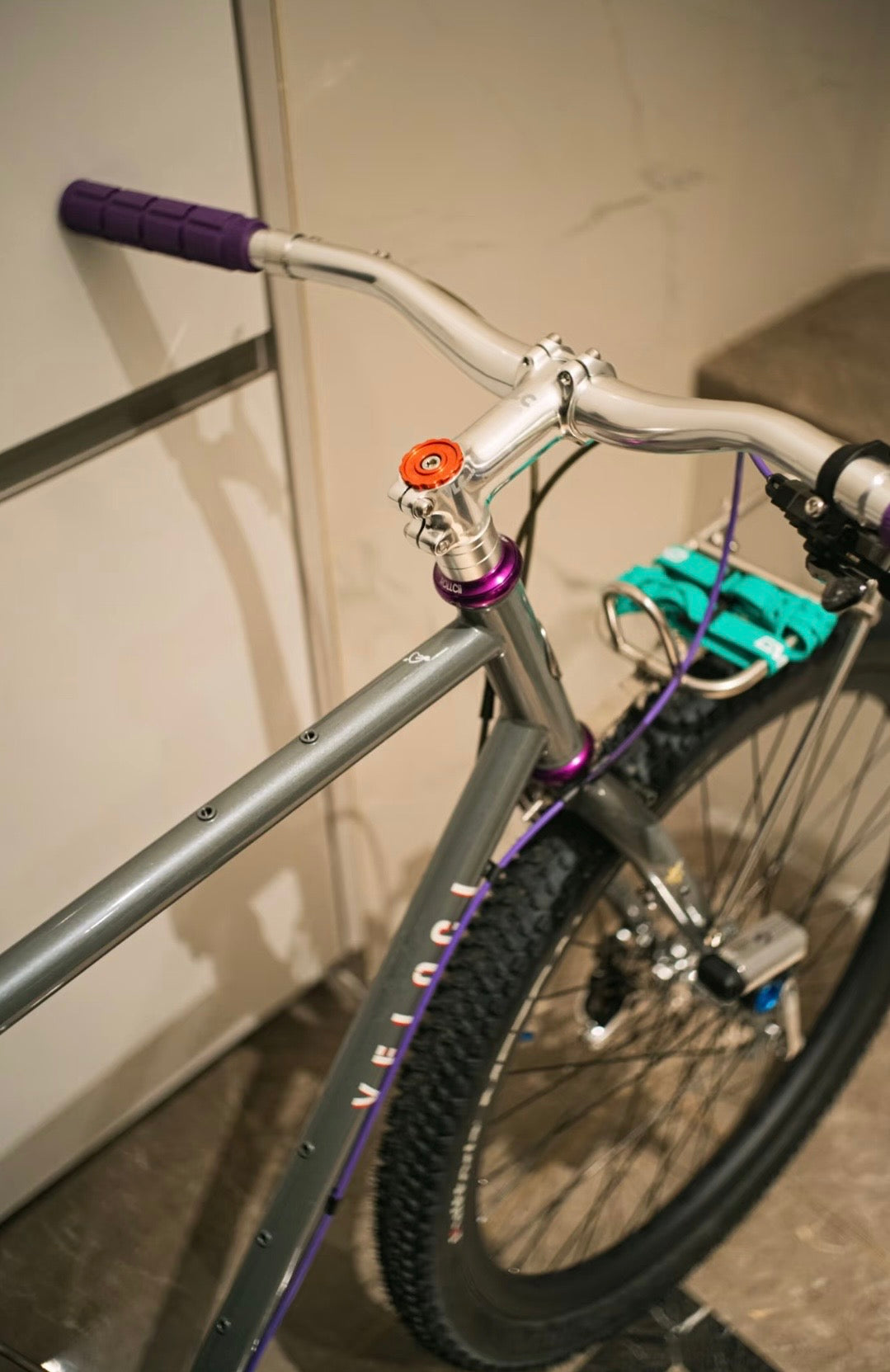 Close-up of a VLCmade Open Bar cockpit with purple grips