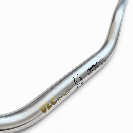Close-up of the VLCmade Open Bar handlebar markings and polished finish
