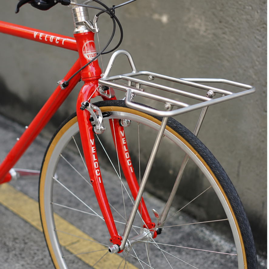 VLCmade Rocket Light silver front rack mounted above the front wheel, angled view